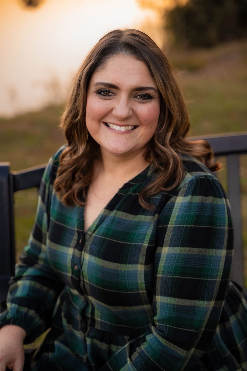 Mandi Griffin smiling outdoors