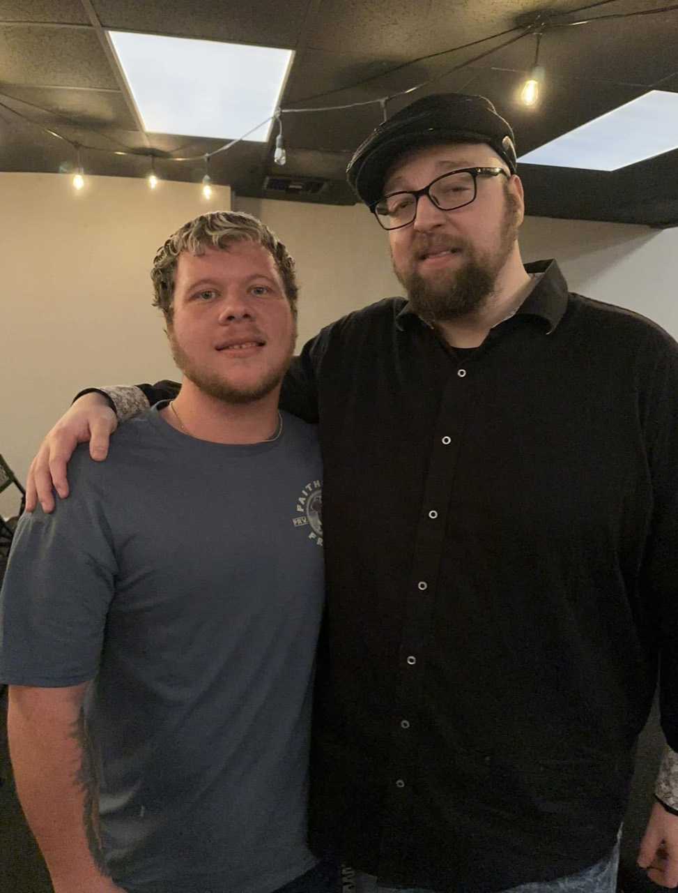 Thomas with one of his sons